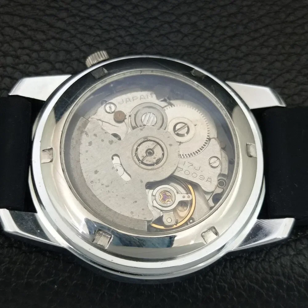Vintage 1973 Seiko Automatic Mens Silver Watch W/daydate & White accents